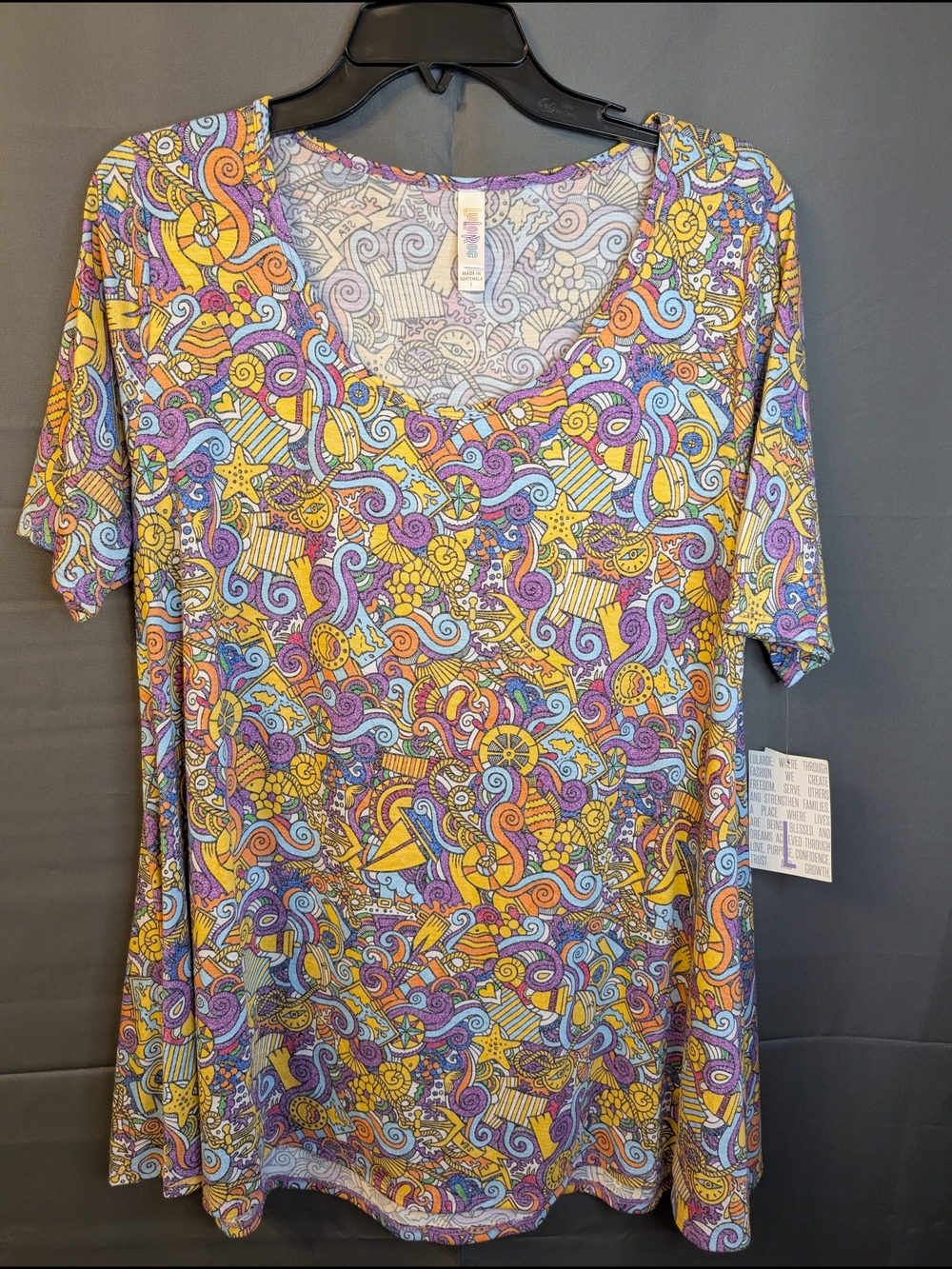 LuLaRoe Short Sleeve Nautical Themed Tee in Yellow, Purple, Blue, Orange